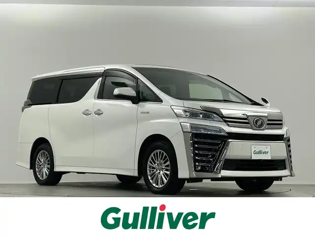 トヨタ ヴェルファイア ハイブリット Z 埼玉県 2019(平31)年 4.5万km ホワイトパールクリスタルシャイン 純正１０型ナビ　フルセグ　バックカメラ　Ｗサンルーフ　電子パーキング　オートブレーキホールド　両側パワースライドドア　レーダークルーズコントロール　純正フリップダウンモニター　ＷＡＣ　ビルドインＥＴＣ