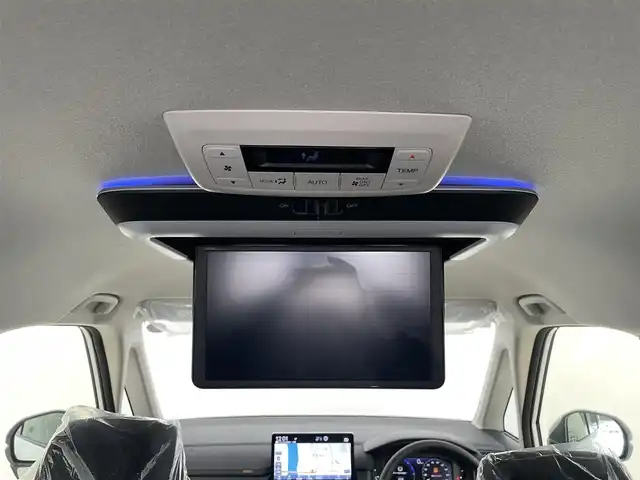 ホンダ ステップワゴン eHEV エアー EX 大分県 2025(令7)年 0.1千km プラチナホワイトパール 純正ナビ/FM/AM/フルセグＴＶ/applecarplay/androidauto/オットマン/フリップダウンモニター/バックカメラ/シートヒーター（D/N）/パワーバックドア/電子パーキング/オートホールド/ホンダセンシング/・衝突軽減ブレーキ/・先行発進お知らせ機能/・コーナーセンサー/・BSM/・後方支援/オートハイビーム/パドルシフト