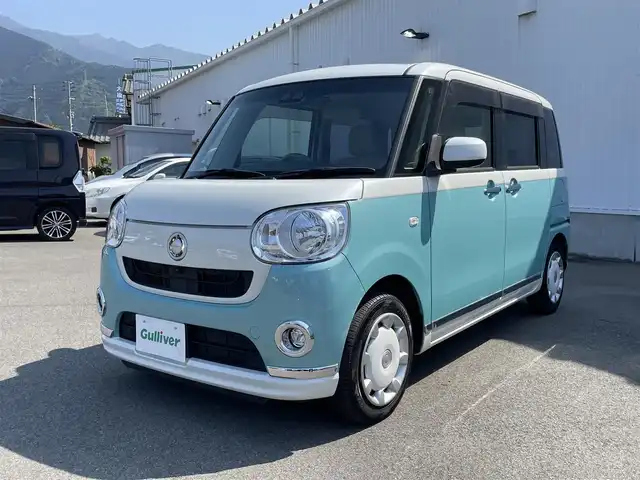 ダイハツ ムーヴ キャンバス X メイクアップ リミテッド SAⅢ 愛媛県 2018(平30)年 6.5万km パールホワイトⅢ/ファインミントメタリック 2トーン 純正SDナビ/AM/FM/CD/DVD/BT/フルセグTV/全周囲カメラ　/両側パワースライドドア　/スマートアシストII/・衝突被害軽減ブレーキ/・車線逸脱警報/・誤発進抑制機能/・先行車発進告知/全周囲ドライブレコーダー　/ETC/ヘッドライトレベライザー　/アイドリングストップ/純正ホイールキャップ/フォグランプ/禁煙車