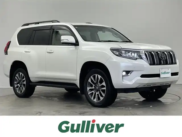 トヨタ ランドクルーザー プラド TX Lパッケージ 埼玉県 2023(令5)年 2.4万km ホワイトパールクリスタルシャイン 衝突軽減システム/ディズプレイオーディオ　ナビあり/全方位カメラ/サンルーフ/レーダークルーズコントロール/シートヒーター/エアシート/フルセグ/バックカメラ/パワーシート/コーナーセンサー/ルーフレール/ETC2.0/LEDヘッドライト/オートマチックハイビーム/ドライブレコーダー/ステアリングスイッチ/スマートキー/プッシュスタート