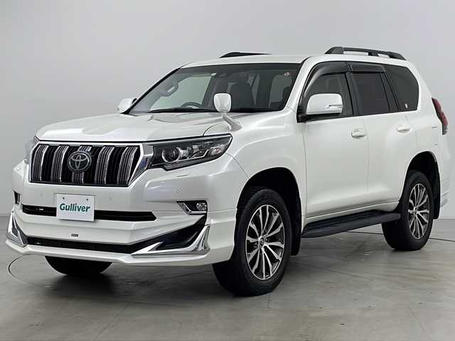 トヨタ ランドクルーザー プラド TX Lパッケージ 道央・札幌 2018(平30)年 1.9万km ホワイトパールクリスタルシャイン ・4WD/・ワンオーナー/・純正ナビ&CD&DVD&BT&TV/・バックカメラ/・レーダークルーズコントロール/・衝突被害軽減ブレーキ/・レーンキープアシスト/・コーナーセンサー/・前席シートヒーター/・前席ベンチレーションシート/・レザーシート/・ETC/・ドライブレコーダー/・モデリスタエアロ/・LEDヘッドライト/・オートライト/・オートマチックハイビーム/・スマートキー