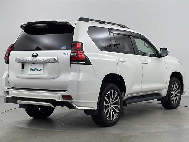 トヨタ ランドクルーザー プラド TX Lパッケージ 道央・札幌 2018(平30)年 1.9万km ホワイトパールクリスタルシャイン ・4WD/・ワンオーナー/・純正ナビ&CD&DVD&BT&TV/・バックカメラ/・レーダークルーズコントロール/・衝突被害軽減ブレーキ/・レーンキープアシスト/・コーナーセンサー/・前席シートヒーター/・前席ベンチレーションシート/・レザーシート/・ETC/・ドライブレコーダー/・モデリスタエアロ/・LEDヘッドライト/・オートライト/・オートマチックハイビーム/・スマートキー