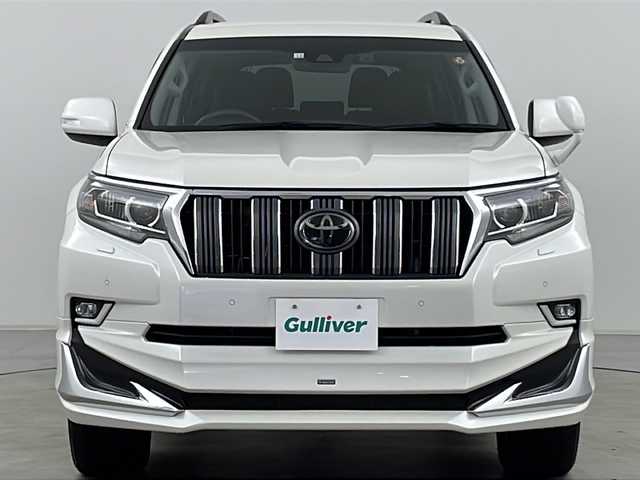 トヨタ ランドクルーザー プラド TX Lパッケージ 道央・札幌 2018(平30)年 1.9万km ホワイトパールクリスタルシャイン ・4WD/・ワンオーナー/・純正ナビ&CD&DVD&BT&TV/・バックカメラ/・レーダークルーズコントロール/・衝突被害軽減ブレーキ/・レーンキープアシスト/・コーナーセンサー/・前席シートヒーター/・前席ベンチレーションシート/・レザーシート/・ETC/・ドライブレコーダー/・モデリスタエアロ/・LEDヘッドライト/・オートライト/・オートマチックハイビーム/・スマートキー