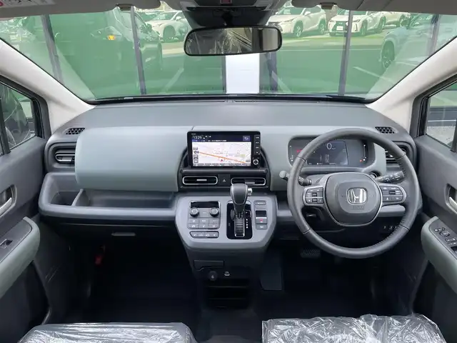 ホンダ フリード ハイブリット e:HEV クロスター 香川県 2025(令7)年 0.1千km クリスタルブラックパール 純正9インチナビ(LXM-242ZFNi)/→AM.FM/フルセグTV/Bluetooth/ホンダセンシング/・アダプティブクルーズコントロール/・衝突軽減ブレーキ/・歩行者事故低減ステアリング/・車線維持支援システム/・路外逸脱抑制機能/・先行車発進お知らせ機能/バックカメラ/両側パワースライドドア/前席シートヒーター/LEDヘッドライト/ブラインドスポットモニター/革巻きステアリング/ステアリングリモコン/オートブレーキホールド/USB/ウィンカーミラー/オートエアコン/パワーウィンドウ/スマートキー/プッシュスタート