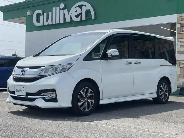 ホンダ ステップワゴン スパーダ 徳島県 2015(平27)年 9.1万km ホワイトオーキッドパール ナビ【AVN-SZ04i】/純正16インチアルミホイール/純正フロアマット/両側パワースライドドア/横滑り防止装置/バックカメラ/オートマチックハイビーム/カーテンエアバッグ/ドライブレコーダー/フォグランプ/プッシュスタート/スマートキー