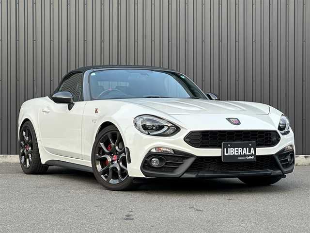 アバルト １２４ スパイダー 福島県 2018(平30)年 2.7万km パール 外装色：ビアンコ アクロポリス1972/レコードモンツァマフラー/Bremboレッドキャリパー/社外車高調（CUSCO）/黒/赤レザーシート/シートヒーター/クルーズコントロール/純正ナビ/フルセグTV/バックカメラ/ETC/オートライト/LEDヘッドライト/純正17インチAW/スマートキー/取扱説明書/保証書/スペアキー