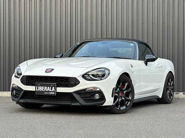 アバルト １２４ スパイダー 福島県 2018(平30)年 2.7万km パール 外装色：ビアンコ アクロポリス1972/レコードモンツァマフラー/Bremboレッドキャリパー/社外車高調（CUSCO）/黒/赤レザーシート/シートヒーター/クルーズコントロール/純正ナビ/フルセグTV/バックカメラ/ETC/オートライト/LEDヘッドライト/純正17インチAW/スマートキー/取扱説明書/保証書/スペアキー
