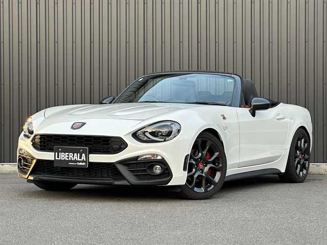 アバルト １２４ スパイダー 福島県 2018(平30)年 2.7万km パール 外装色：ビアンコ アクロポリス1972/レコードモンツァマフラー/Bremboレッドキャリパー/社外車高調（CUSCO）/黒/赤レザーシート/シートヒーター/クルーズコントロール/純正ナビ/フルセグTV/バックカメラ/ETC/オートライト/LEDヘッドライト/純正17インチAW/スマートキー/取扱説明書/保証書/スペアキー