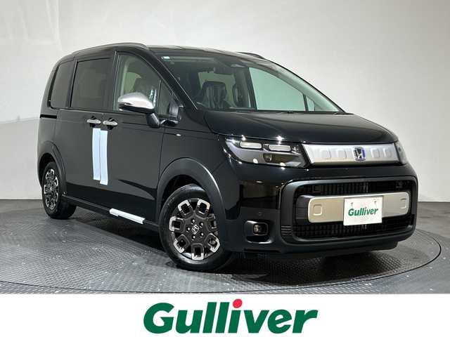 ホンダ フリード ハイブリット e:HEV クロスター 愛媛県 2025(令7)年 0.1千km クリスタルブラックパール 登録済未使用車　ＨｏｎｄａＣＯＮＮＥＣＴナビ　フルセグＴＶ　バックカメラ　ブラインドスポットモニター　シートヒーター　衝突被害軽減ブレーキ　アダプティブクルーズコントロール　両側電動スライドドア　禁煙