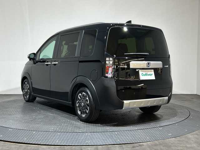 ホンダ フリード ハイブリット e:HEV クロスター 愛媛県 2025(令7)年 0.1千km クリスタルブラックパール 登録済未使用車　ＨｏｎｄａＣＯＮＮＥＣＴナビ　フルセグＴＶ　バックカメラ　ブラインドスポットモニター　シートヒーター　衝突被害軽減ブレーキ　アダプティブクルーズコントロール　両側電動スライドドア　禁煙