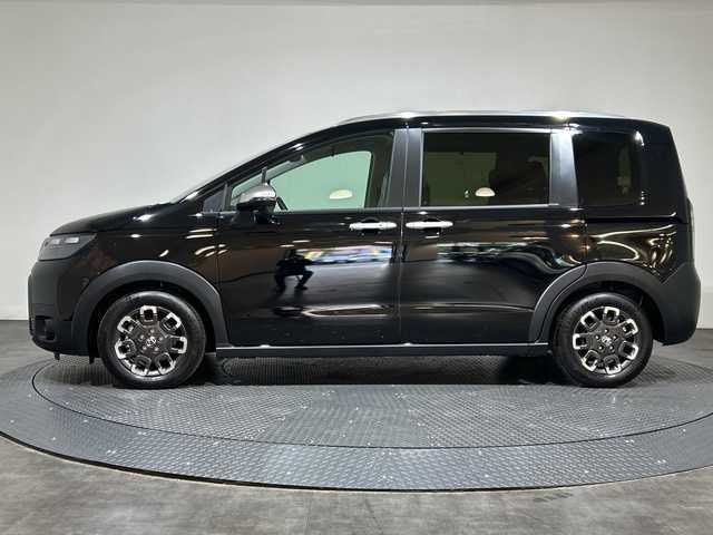 ホンダ フリード ハイブリット e:HEV クロスター 愛媛県 2025(令7)年 0.1千km クリスタルブラックパール 登録済未使用車　ＨｏｎｄａＣＯＮＮＥＣＴナビ　フルセグＴＶ　バックカメラ　ブラインドスポットモニター　シートヒーター　衝突被害軽減ブレーキ　アダプティブクルーズコントロール　両側電動スライドドア　禁煙