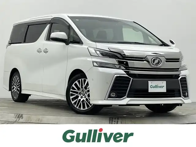 トヨタ ヴェルファイア Z Gエディション 宮城県 2017(平29)年 10万km ホワイトパールクリスタルシャイン ワンオーナー/フリップダウンモニター/JBLサウンド/純正ナビ/(フルセグTV/AM/FM/CD/DVD/Bluetooth)/バックカメラ/ステアリングヒーター/スペアキー×1/ビルトインETC/パワーバックドア/両側パワースライドドア/クルーズコントロール/横滑り防止装置/クリアランスソナー/衝突被害軽減システム/レーンキープアシスト/オートライト/ハーフレザー/オットマン/前席パワーシート/純正18インチAW/純正フロアマット/純正LEDヘッドライト