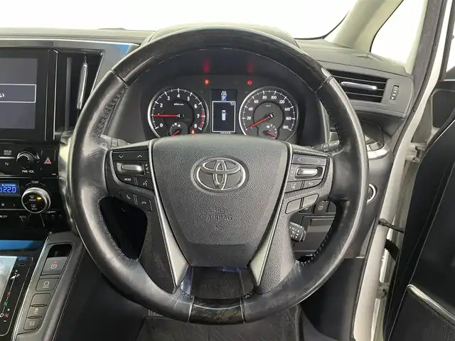 トヨタ ヴェルファイア Z Gエディション 宮城県 2017(平29)年 10万km ホワイトパールクリスタルシャイン ワンオーナー/フリップダウンモニター/JBLサウンド/純正ナビ/(フルセグTV/AM/FM/CD/DVD/Bluetooth)/バックカメラ/ステアリングヒーター/スペアキー×1/ビルトインETC/パワーバックドア/両側パワースライドドア/クルーズコントロール/横滑り防止装置/クリアランスソナー/衝突被害軽減システム/レーンキープアシスト/オートライト/ハーフレザー/オットマン/前席パワーシート/純正18インチAW/純正フロアマット/純正LEDヘッドライト