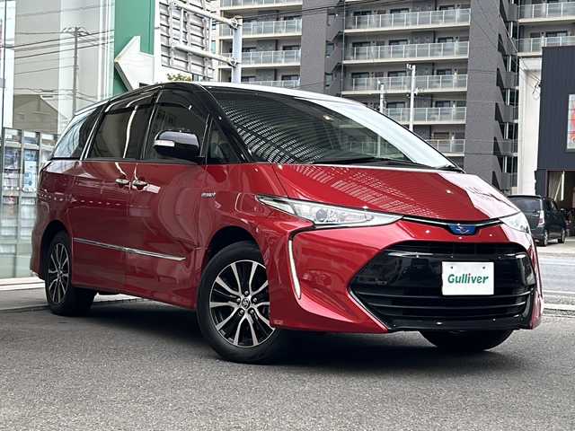 トヨタ エスティマ ハイブリッド アエラス プレミアム G 高知県 2019(令1)年 3.2万km ブラック/レッドマイカメタリック 2トーン 両側パワースライドドア　/純正12型フリップダウンモニター　（V12T-R18C)　/純正１０インチナビ　（NSZN-Z68T）/【Ｂｌｕｅｔｏｏｔｈ　ＴＶ　ＤＶＤ　ＣＤ　Ｔ－ｃｏｎｎｅｃｔ　後席会話支援】/バックカメラ　/ＥＴＣ２．０　/前後ドラレコ　/運転席パワーシート/1列目シートヒーター/2列目オットマン/電動格納サードシート/電動リアゲート/レーンキープアシスト/衝突被害軽減システム/前後コーナーセンサー/オートマチックハイビーム/保証書/取扱説明書/スペアキー