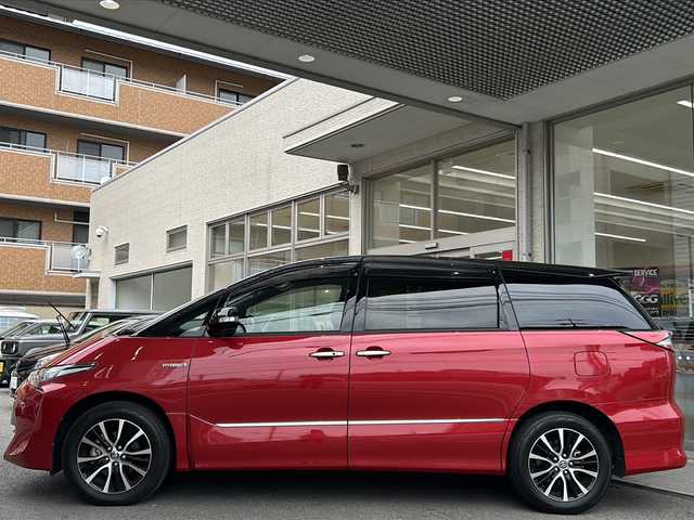 トヨタ エスティマ ハイブリッド アエラス プレミアム G 高知県 2019(令1)年 3.2万km ブラック/レッドマイカメタリック 2トーン 両側パワースライドドア　/純正12型フリップダウンモニター　（V12T-R18C)　/純正１０インチナビ　（NSZN-Z68T）/【Ｂｌｕｅｔｏｏｔｈ　ＴＶ　ＤＶＤ　ＣＤ　Ｔ－ｃｏｎｎｅｃｔ　後席会話支援】/バックカメラ　/ＥＴＣ２．０　/前後ドラレコ　/運転席パワーシート/1列目シートヒーター/2列目オットマン/電動格納サードシート/電動リアゲート/レーンキープアシスト/衝突被害軽減システム/前後コーナーセンサー/オートマチックハイビーム/保証書/取扱説明書/スペアキー