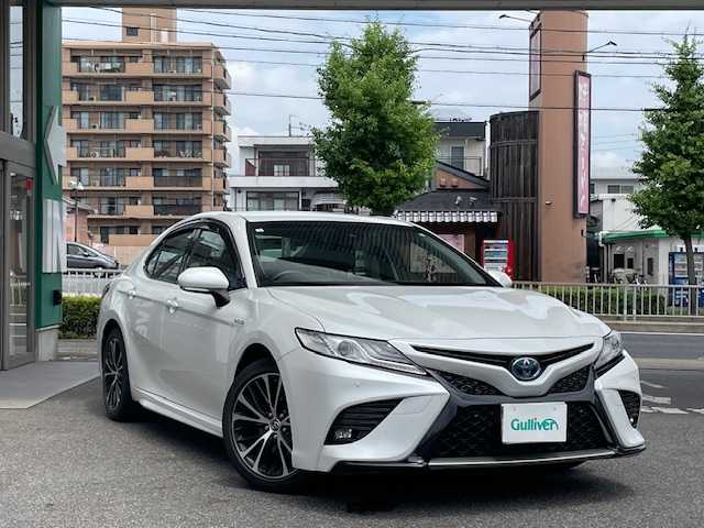 トヨタ カムリ WSレザーパッケージ 福岡県 2019(平31)年 5.4万km プラチナホワイトパールマイカ 禁煙車/ワンオーナー/純正メモリナビ/フルセグTV/CD/DVD/SD/USB/Bluetooth/AUX/バックカメラ/レザーシート【黒】/前席パワーシート/前席シートヒーター/純正18インチアルミホイール/トヨタセーフティセンス/プリクラッシュセーフティ/レーダークルーズコントロール/レーンディパーチャーアラート/オートマチックハイビーム/インテリジェントクリアランスソナー/ブラインドスポッドモニター/リアクロストラフィックオートブレーキ/ヘッドアップディスプレイ/パドルシフト/LEDオートライト/ドラレコ/ビルトインETC/電子パーキングブレーキ/ブレーキホールド/革巻きステアリング/ステアリングスイッチ/純正フロアマット/純正ドアバイザー/スペアキー1本/取扱説明書//保証書