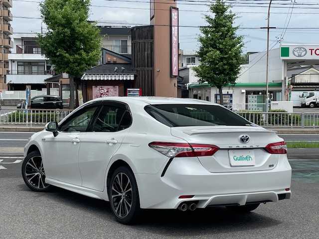 トヨタ カムリ WSレザーパッケージ 福岡県 2019(平31)年 5.4万km プラチナホワイトパールマイカ 禁煙車/ワンオーナー/純正メモリナビ/フルセグTV/CD/DVD/SD/USB/Bluetooth/AUX/バックカメラ/レザーシート【黒】/前席パワーシート/前席シートヒーター/純正18インチアルミホイール/トヨタセーフティセンス/プリクラッシュセーフティ/レーダークルーズコントロール/レーンディパーチャーアラート/オートマチックハイビーム/インテリジェントクリアランスソナー/ブラインドスポッドモニター/リアクロストラフィックオートブレーキ/ヘッドアップディスプレイ/パドルシフト/LEDオートライト/ドラレコ/ビルトインETC/電子パーキングブレーキ/ブレーキホールド/革巻きステアリング/ステアリングスイッチ/純正フロアマット/純正ドアバイザー/スペアキー1本/取扱説明書//保証書