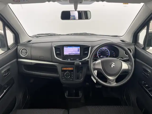 スズキ ワゴンＲ スティングレー X 富山県 2014(平26)年 4.5万km ミステリアスバイオレットパール 4WD/社外ナビ(AM/FM/CD/AUX/iPod)/ワンセグTV/アイドリングストップ/純正フロアマット/革巻きステアリング/スマートキー/プッシュスタート/ベンチシート/パワーステアリング/パワーウィンドウ/ハロゲンヘッドライト/オートライト/フォグランプ/電動格納ミラー/ドアバイザー/バニティミラー