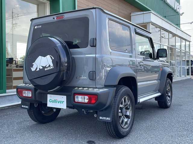 スズキ ジムニー シエラ JC 岐阜県 2021(令3)年 1.8万km ミディアムグレー 禁煙車/純正8型ナビ(AM/FM/CD/DVD/BT/フルセグTV)/衝突被害軽減ブレーキ/クルーズコントロール/5MT/4WD/前後ドラレコ/ビルトインETC/ステアリングリモコン/オートライト/LEDヘッドライト/フォグランプ/LDA/シートヒーター/スマートキー/Pスタート/純正AW/純正フロアマット