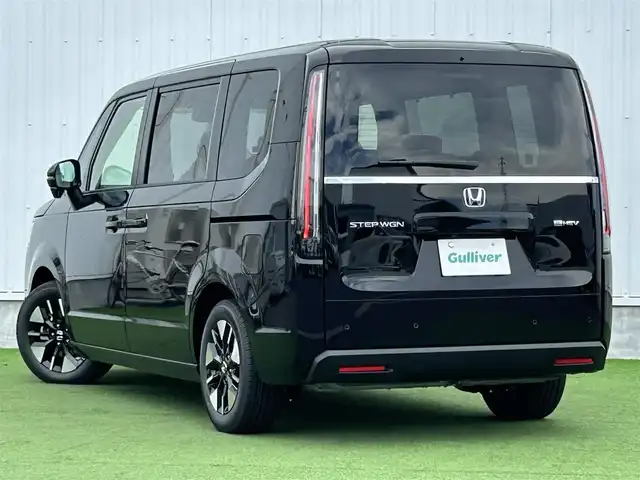 ホンダ ステップワゴン eHEV エアー EX 香川県 2025(令7)年 0.1千km クリスタルブラックパール 登録時走行距離：4km/純正11.4型SDナビゲーション/→フルセグTV/→CD/DVD再生/バックカメラ/ETC2.0/ステアリングリモコン/レーダークルーズコントロール/オットマン/両側パワースライドドア/純正16型アルミホイール/前後コーナーセンサー/LEDオートライト/フォグランプ/オートハイビーム/プッシュスタート/スマートキー/スペアキー