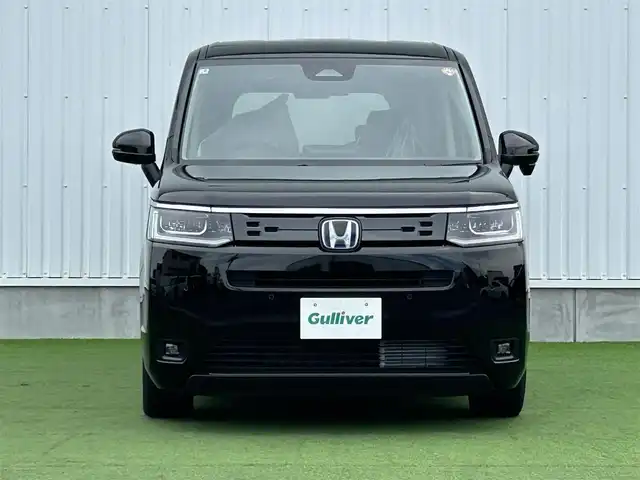 ホンダ ステップワゴン eHEV エアー EX 香川県 2025(令7)年 0.1千km クリスタルブラックパール 登録時走行距離：4km/純正11.4型SDナビゲーション/→フルセグTV/→CD/DVD再生/バックカメラ/ETC2.0/ステアリングリモコン/レーダークルーズコントロール/オットマン/両側パワースライドドア/純正16型アルミホイール/前後コーナーセンサー/LEDオートライト/フォグランプ/オートハイビーム/プッシュスタート/スマートキー/スペアキー