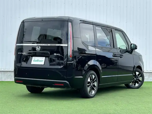 ホンダ ステップワゴン eHEV エアー EX 香川県 2025(令7)年 0.1千km クリスタルブラックパール 登録時走行距離：4km/純正11.4型SDナビゲーション/→フルセグTV/→CD/DVD再生/バックカメラ/ETC2.0/ステアリングリモコン/レーダークルーズコントロール/オットマン/両側パワースライドドア/純正16型アルミホイール/前後コーナーセンサー/LEDオートライト/フォグランプ/オートハイビーム/プッシュスタート/スマートキー/スペアキー