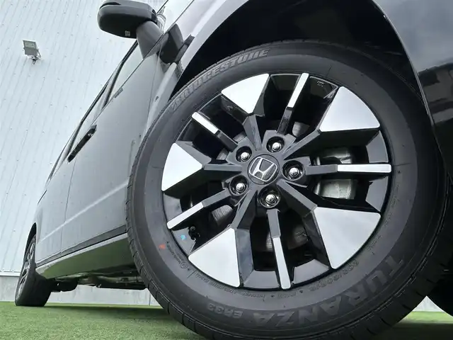 ホンダ ステップワゴン eHEV エアー EX 香川県 2025(令7)年 0.1千km クリスタルブラックパール 登録時走行距離：4km/純正11.4型SDナビゲーション/→フルセグTV/→CD/DVD再生/バックカメラ/ETC2.0/ステアリングリモコン/レーダークルーズコントロール/オットマン/両側パワースライドドア/純正16型アルミホイール/前後コーナーセンサー/LEDオートライト/フォグランプ/オートハイビーム/プッシュスタート/スマートキー/スペアキー