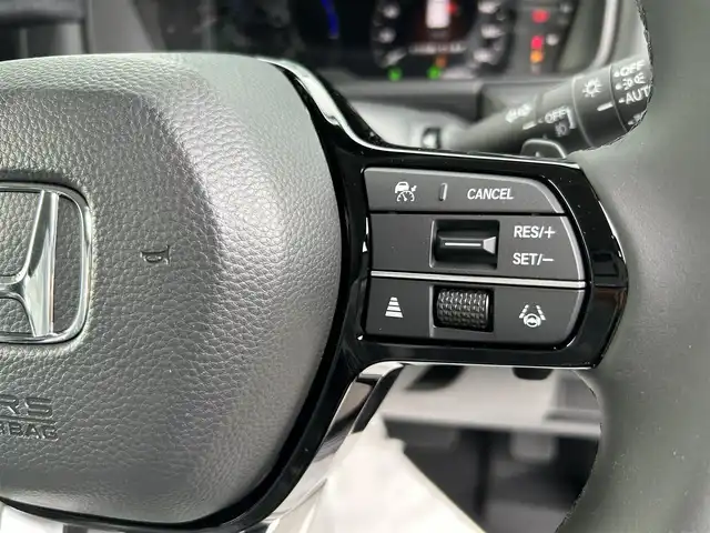 ホンダ ステップワゴン eHEV エアー EX 香川県 2025(令7)年 0.1千km クリスタルブラックパール 登録時走行距離：4km/純正11.4型SDナビゲーション/→フルセグTV/→CD/DVD再生/バックカメラ/ETC2.0/ステアリングリモコン/レーダークルーズコントロール/オットマン/両側パワースライドドア/純正16型アルミホイール/前後コーナーセンサー/LEDオートライト/フォグランプ/オートハイビーム/プッシュスタート/スマートキー/スペアキー