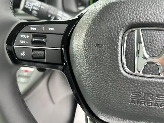 ホンダ ステップワゴン eHEV エアー EX 香川県 2025(令7)年 0.1千km クリスタルブラックパール 登録時走行距離：4km/純正11.4型SDナビゲーション/→フルセグTV/→CD/DVD再生/バックカメラ/ETC2.0/ステアリングリモコン/レーダークルーズコントロール/オットマン/両側パワースライドドア/純正16型アルミホイール/前後コーナーセンサー/LEDオートライト/フォグランプ/オートハイビーム/プッシュスタート/スマートキー/スペアキー