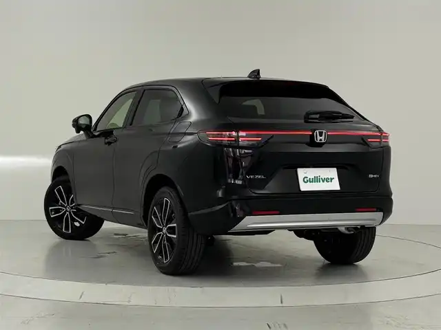 ホンダ ヴェゼル ハイブリッド e:HEV Z 大阪府 2025(令7)年 0.1千km クリスタルブラックパール 登録済み未使用車/・衝突軽減ブレーキ（CMBS）/・誤発進抑制機能/・後方誤発進抑制機能/・近距離衝突軽減ブレーキ/・歩行者事故低減ステアリング/・路外逸脱抑制機能/・アダプティブクルーズコントロール（ACC）/・車線維持支援システム（LKAS）/・トラフィックジャムアシスト/・先行車発進お知らせ機能/・標識認識機能/・オートハイビーム/・アダプティブドライビングビーム/・パーキングセンサーシステム/・急アクセル抑制機能/・ブラインドスポットインフォメーション/・後退出庫サポート/・・Honda パーキングパイロット/ドライバー注意力モニター/純正ナビ（ApplcarPlay.AndroidAuto.BT）/バックメラ/パワーバックドア/置くだけ充電/ETC2.0