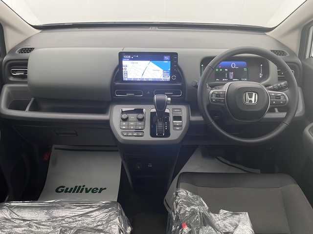 ホンダ フリード ハイブリット e:HEV クロスター 宮崎県 2025(令7)年 0.1千km プラチナホワイトパール 登録済み未使用車/ホンダセンシング/純正9型ディスプレイオーディオナビTV/（LXM-242ZFNI/HONDA CONNECT/Bluetooth/FMAM/HDMI/フルセグTV)/純正バックカメラ/純正LEDオートライト/純正LEDフォグ/純正15インチアルミ/両側電動スライドドア/アダプティブクルーズコントロール/レーンディパーチャーアラート/ブラインドスポットモニター/クリアランスソナー/電子パーキング/オートホールド/ハーフレザーシート/前席シートヒーター/本革巻ハンドル/オートエアコン/スマートキー/プッシュエンジンスタート/スペアキー/新車時保証書/取扱い説明書