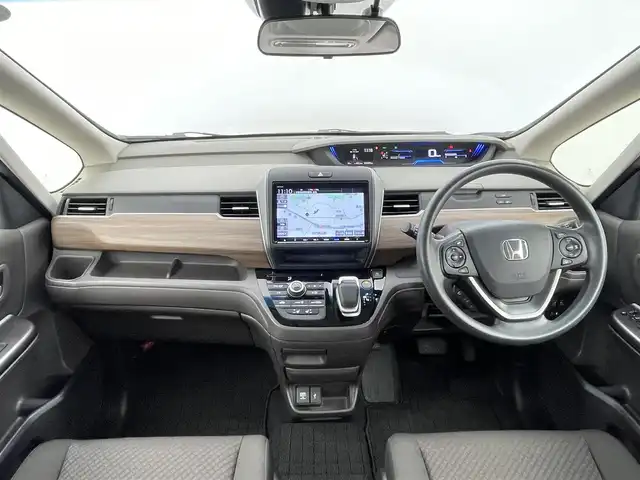 ホンダ フリード ハイブリット G ホンダセンシング 千葉県 2020(令2)年 1.1万km プラチナホワイトパール 禁煙車　/純正９型ナビ（VXM-217VFNi）/AM＆FM＆Bluetooth＆フルセグTV＆CD＆DVD/純正後席モニター　/ビルトインＥＴＣ　/ホンダセンシング/衝突軽減ブレーキ　/レーダークルーズコントロール　/レーンキープアシスト/バックカメラ　/シートヒーター　/両側電動スライドドア　/電動格納サイドミラー　/ＵＳＢポート/アイドリングストップ/ウィンカーミラー/2列目キャプテンシート/ドアバイザー/プッシュスタート/フロント電熱線