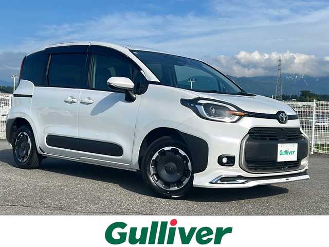 トヨタ シエンタ ハイブリッド Z 富山県 2024(令6)年 1.8万km プラチナホワイトパールマイカ モデリスタ　/４ＷＤ　/１０．５インチＴコネクティッドナビ　/全方位カメラ　/衝突被害軽減ブレーキ/レーンアシスト/レーダークルーズコントロール　/両側パワースライドドア　/１００Ｖ電源　/ブラインドスポットモニター　/コーナーセンサー　/シートヒーター(D/N)/純正ビルトインＥＴＣ2.0/ステアリングヒーター/オートハイビーム/USB入力端子/スペアキー/LEDヘッドライト