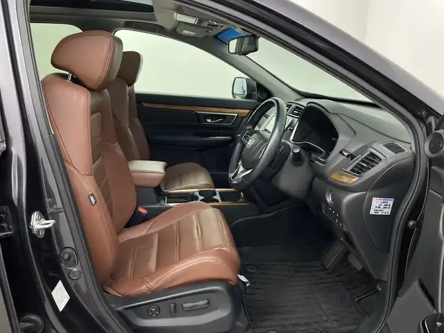 ホンダ ＣＲ－Ｖ ハイブリッド EX・マスターピース 鹿児島県 2019(平31)年 9.4万km ルーセブラックM ワンオーナー/純正SDナビ/(BT/CD/DVD/AM/FM/フルセグTV)/ホンダセンシング/レーダークルーズコントロール/衝突軽減ブレーキ/レーンキープアシスト/ブラインドスポットモニター/パドルシフト/パワーバックドア/前席パワーシート/シートメモリー/バックカメラ/前席シートヒーター/電動パーキングブレーキ/オートホールド/ビルトインETC2.0/前後コーナーセンサー/サンルーフ/純正18インチアルミホイール/純正フロアマット/純正LEDヘッドライト/アイドリングストップ/保証書/取扱説明書
