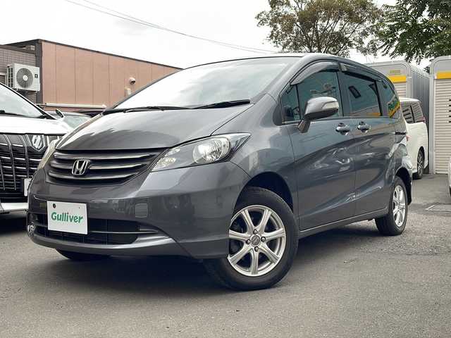 ホンダ フリード G ジャストセレクション 道央・札幌 2010(平22)年 2.8万km ポリッシュドメタルメタリック 純正オーディオ(FM、AM)/純正ドアバイザー/左側パワースライドドア/ワイパーデアイサー/積み込みタイヤ(スタッドレス)/純正フロアマット/電動格納ミラー/オートライト/３列シート