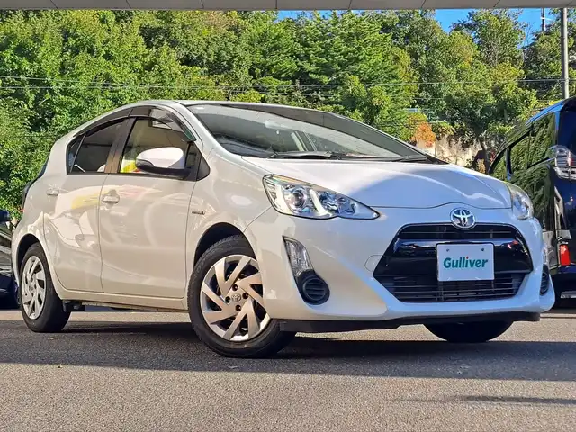 トヨタ アクア S 大阪府 2015(平27)年 2.9万km ライムホワイトパールクリスタルシャイン /禁煙//ワンオーナー//純正SDナビ【NSZN-W64T】//・CD/DVD/SD/フルTV/Bluetooth//バックカメラ//ステアリングスイッチ//ETC//プッシュスタート//スマートキーｘ２//ウィンカーミラー