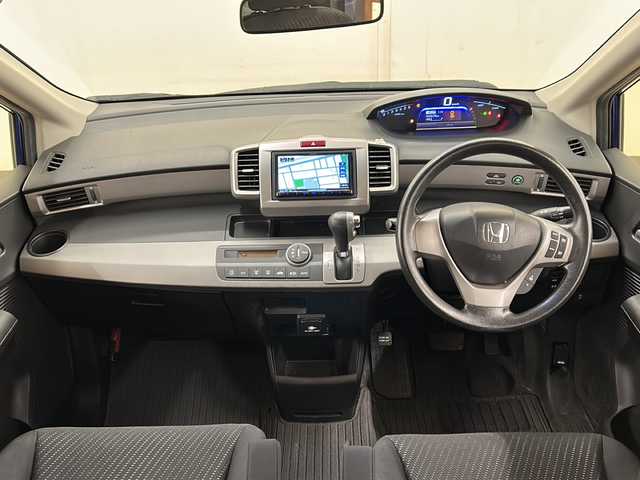 ホンダ フリード ハイブリット ジャストセレクション 道央・札幌 2013(平25)年 6.9万km コバルトブルーパール メモリナビ//ワンセグテレビ//バックカメラ//クルーズコントロール//ドアバイザー//両側パワースライドドア//オートライト//パワーウィンドウ