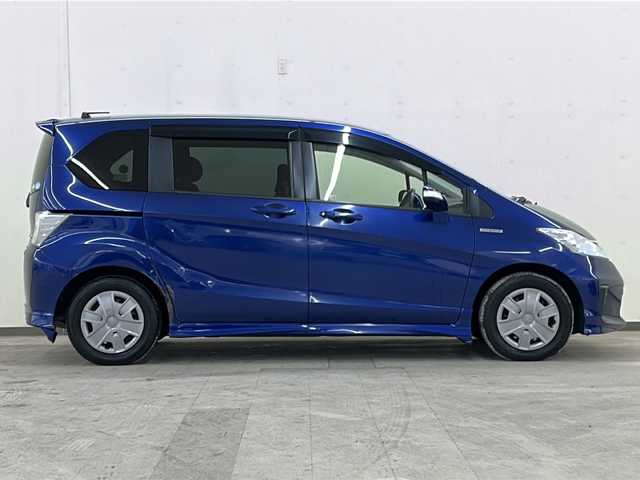 ホンダ フリード ハイブリット ジャストセレクション 道央・札幌 2013(平25)年 6.9万km コバルトブルーパール メモリナビ//ワンセグテレビ//バックカメラ//クルーズコントロール//ドアバイザー//両側パワースライドドア//オートライト//パワーウィンドウ