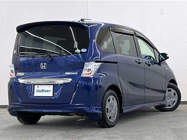 ホンダ フリード ハイブリット ジャストセレクション 道央・札幌 2013(平25)年 6.9万km コバルトブルーパール メモリナビ//ワンセグテレビ//バックカメラ//クルーズコントロール//ドアバイザー//両側パワースライドドア//オートライト//パワーウィンドウ