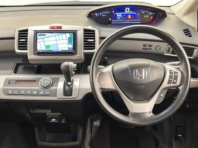 ホンダ フリード ハイブリット ジャストセレクション 道央・札幌 2013(平25)年 6.9万km コバルトブルーパール メモリナビ//ワンセグテレビ//バックカメラ//クルーズコントロール//ドアバイザー//両側パワースライドドア//オートライト//パワーウィンドウ