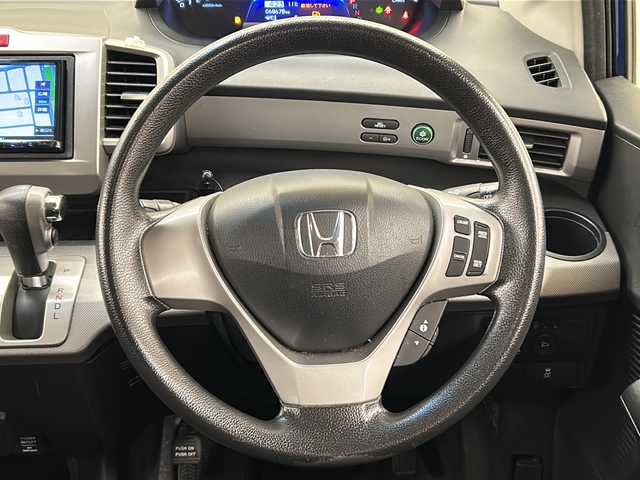 ホンダ フリード ハイブリット ジャストセレクション 道央・札幌 2013(平25)年 6.9万km コバルトブルーパール メモリナビ//ワンセグテレビ//バックカメラ//クルーズコントロール//ドアバイザー//両側パワースライドドア//オートライト//パワーウィンドウ