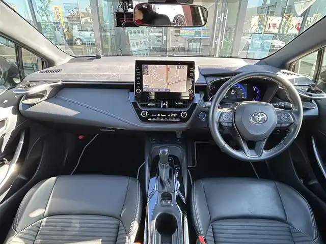 トヨタ カローラツーリング ハイブリッド ダブルバイビー 愛媛県 2020(令2)年 1.5万km ホワイトパールクリスタルシャイン 純正9型ディスプレイオーディオ/バックカメラ/前後ドライブレコーダー/トヨタセーフティセンス/レーダークルーズコントロール/ブラインドスポットモニター/クリアランスソナー/100V/1500Wコンセント/ハーフレザー/シートヒーター/ワイヤレス充電/電格ミラー/ヒートミラー/ステアリングリモコン/ステアリングヒーター/純正ドアバイザー/電動パーキングブレーキ/AutoHold機能/MODELLISTAスカッフプレート/現状サマー(純正AW)(215/45/R17)/YOKOHAMA ADVANdB V552/禁煙車