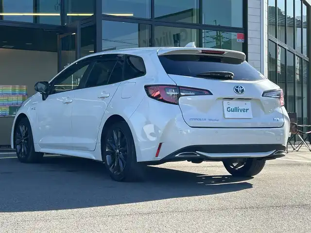 トヨタ カローラツーリング ハイブリッド ダブルバイビー 愛媛県 2020(令2)年 1.5万km ホワイトパールクリスタルシャイン 純正9型ディスプレイオーディオ/バックカメラ/前後ドライブレコーダー/トヨタセーフティセンス/レーダークルーズコントロール/ブラインドスポットモニター/クリアランスソナー/100V/1500Wコンセント/ハーフレザー/シートヒーター/ワイヤレス充電/電格ミラー/ヒートミラー/ステアリングリモコン/ステアリングヒーター/純正ドアバイザー/電動パーキングブレーキ/AutoHold機能/MODELLISTAスカッフプレート/現状サマー(純正AW)(215/45/R17)/YOKOHAMA ADVANdB V552/禁煙車