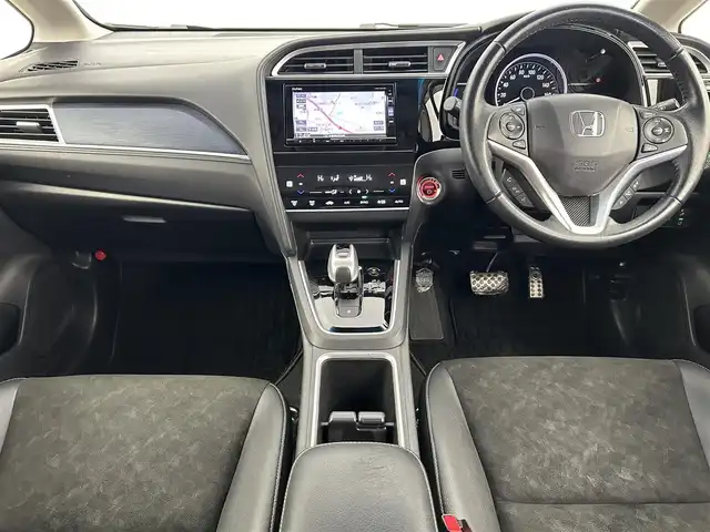 ホンダ シャトル ハイブリッド X ホンダセンシング 千葉県 2019(平31)年 5.4万km ミッドナイトブルービームM 禁煙　/純正７型ナビ（VXM-195VFi）/AM＆FM＆Bluetooth＆フルセグTV＆CD＆DVD/前席シートヒーター　/ビルトインＥＴＣ　/ホンダセンシング/レーダークルーズコントロール/レーンキープアシスト　/バックカメラ　/電動格納サイドミラー　/パドルシフト　/ＬＥＤヘッドライト（オートライト付き）/フォグランプ/12Vシガーソケット/アイドリングストップ/ウィンカーミラー/ドアバイザー/プッシュスタート/フロアマット/ハーフレザーシート/ISOFIX