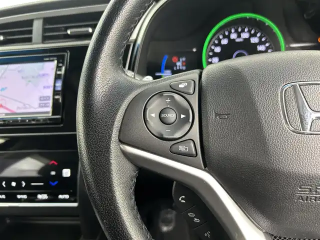 ホンダ シャトル ハイブリッド X ホンダセンシング 千葉県 2019(平31)年 5.4万km ミッドナイトブルービームM 禁煙　/純正７型ナビ（VXM-195VFi）/AM＆FM＆Bluetooth＆フルセグTV＆CD＆DVD/前席シートヒーター　/ビルトインＥＴＣ　/ホンダセンシング/レーダークルーズコントロール/レーンキープアシスト　/バックカメラ　/電動格納サイドミラー　/パドルシフト　/ＬＥＤヘッドライト（オートライト付き）/フォグランプ/12Vシガーソケット/アイドリングストップ/ウィンカーミラー/ドアバイザー/プッシュスタート/フロアマット/ハーフレザーシート/ISOFIX