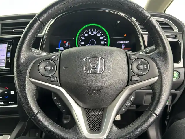 ホンダ シャトル ハイブリッド X ホンダセンシング 千葉県 2019(平31)年 5.4万km ミッドナイトブルービームM 禁煙　/純正７型ナビ（VXM-195VFi）/AM＆FM＆Bluetooth＆フルセグTV＆CD＆DVD/前席シートヒーター　/ビルトインＥＴＣ　/ホンダセンシング/レーダークルーズコントロール/レーンキープアシスト　/バックカメラ　/電動格納サイドミラー　/パドルシフト　/ＬＥＤヘッドライト（オートライト付き）/フォグランプ/12Vシガーソケット/アイドリングストップ/ウィンカーミラー/ドアバイザー/プッシュスタート/フロアマット/ハーフレザーシート/ISOFIX