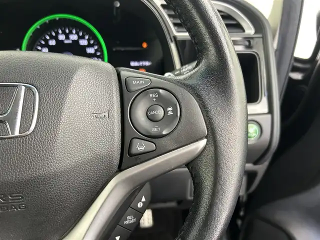 ホンダ シャトル ハイブリッド X ホンダセンシング 千葉県 2019(平31)年 5.4万km ミッドナイトブルービームM 禁煙　/純正７型ナビ（VXM-195VFi）/AM＆FM＆Bluetooth＆フルセグTV＆CD＆DVD/前席シートヒーター　/ビルトインＥＴＣ　/ホンダセンシング/レーダークルーズコントロール/レーンキープアシスト　/バックカメラ　/電動格納サイドミラー　/パドルシフト　/ＬＥＤヘッドライト（オートライト付き）/フォグランプ/12Vシガーソケット/アイドリングストップ/ウィンカーミラー/ドアバイザー/プッシュスタート/フロアマット/ハーフレザーシート/ISOFIX