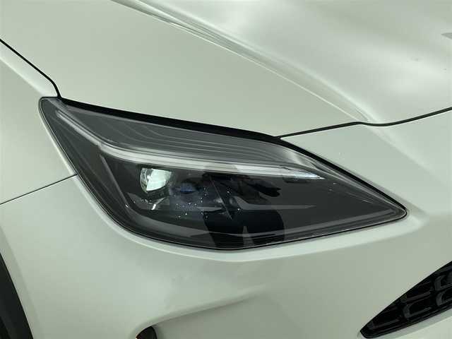 トヨタ ヤリスクロス ハイブリッド Z 福井県 2022(令4)年 2.5万km ホワイトパールクリスタルシャイン 純正７インチT-Connectナビ/フルセグTV/Bluetooth/USB/Miracast/AM/FM/CD/DVDデッキ【純正オプション】/Toyota Safety Sense/・プリクラッシュセーフティ/・レーンアシスト/・クルーズコントロール/・オートマチックハイビーム/・オートライト /LEDヘッドライト/ライトレベライザー /パノラミックビューモニター/ブラインドスポットモニター/パワーシート/シートヒーター /純正１８インチアルミ/純正フロアマット/サイドバイザー/取説あり
