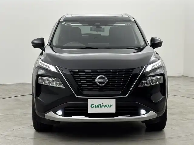 日産 エクストレイル G e－4ORCE 福岡県 2022(令4)年 2.1万km ダイヤモンドブラック サンルーフ　/純正９型ナビ/フルセグTV　/バックカメラ　/ＢＯＳＥプレミアムサウンド　/ワイヤレス充電　/デジタルルームミラー　/前後ドラレコ　/ビルトインETC２．０　/プロパイロット　/コーナーセンサー　/エマージェンシーブレーキ　/レーンキープ　/ブラインドスポットモニター　/パーキングアシスト　/ヒルディセントコントロール/シートヒーター　/ステアリングヒーター　/パワーバックドア　/純正１９インチアルミホイール