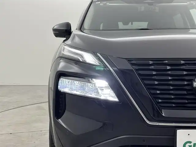 日産 エクストレイル G e－4ORCE 福岡県 2022(令4)年 2.1万km ダイヤモンドブラック サンルーフ　/純正９型ナビ/フルセグTV　/バックカメラ　/ＢＯＳＥプレミアムサウンド　/ワイヤレス充電　/デジタルルームミラー　/前後ドラレコ　/ビルトインETC２．０　/プロパイロット　/コーナーセンサー　/エマージェンシーブレーキ　/レーンキープ　/ブラインドスポットモニター　/パーキングアシスト　/ヒルディセントコントロール/シートヒーター　/ステアリングヒーター　/パワーバックドア　/純正１９インチアルミホイール